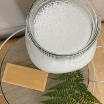 homemade laundry soap with a soap bar