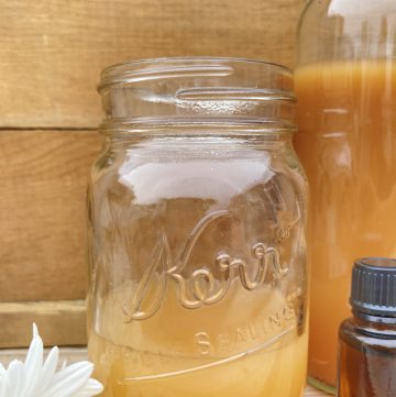 apple cider vinegar hair rinse in a mason jar