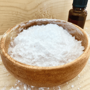 antifungal foot powder in a wooden bowl