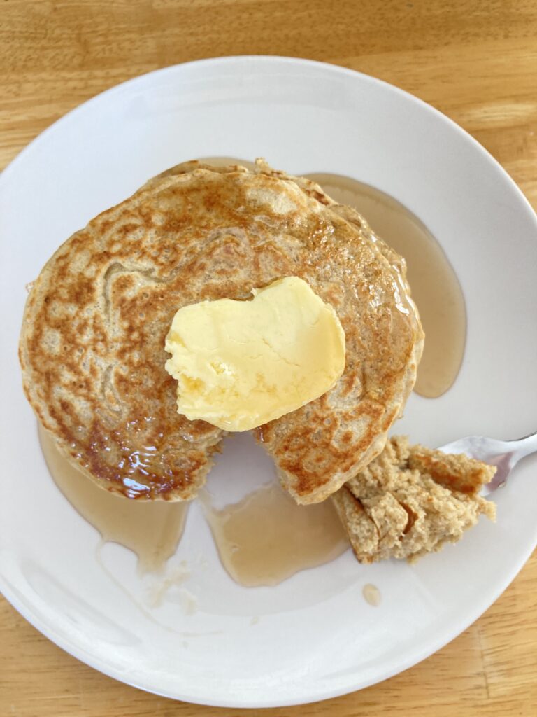 oat flour pancakes with butter and syrup