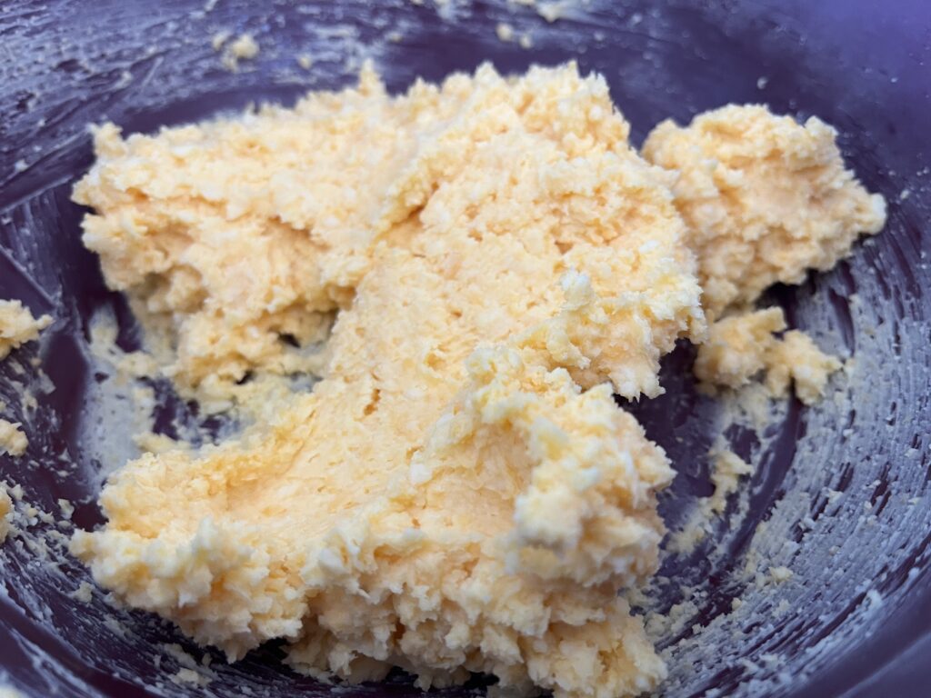 fluffy butter and cheese mixture in a bowl