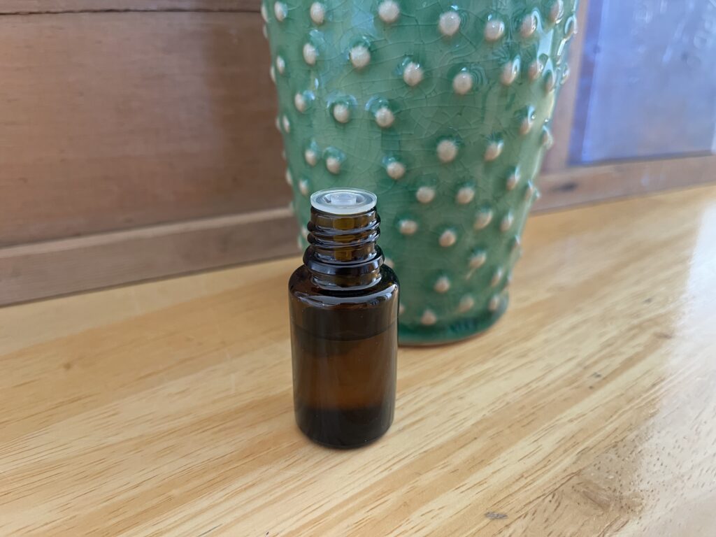 lemongrass essential oil in a amber bottle